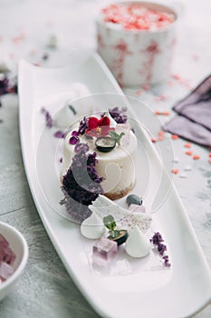 Foodstyling with decor and sweets in purple