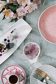 Foodstyling with decor and sweets in purple photo