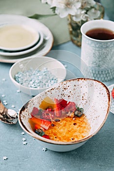 Foodstyling with tea on wooden background