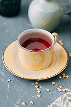 Foodstyling with tea on wooden background