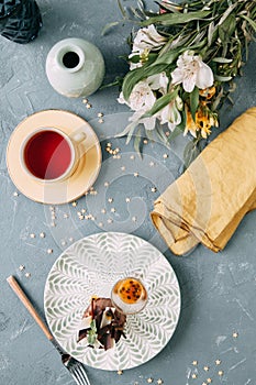 Foodstyling with tea on wooden background