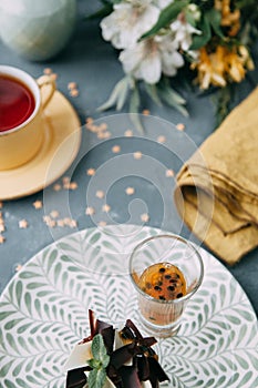 Foodstyling with tea on wooden background