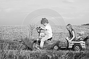 Fool around. Little boy and girl enjoy life and nature. Happy day. Happy childhood. Happy smiling children on nature