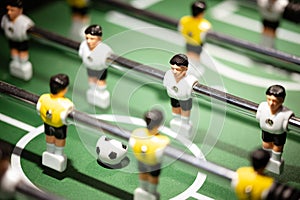 Foosball team playing against opponents