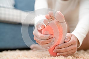 Foot ankle injury pain women touch her foot painful, healthcare and medicine concept