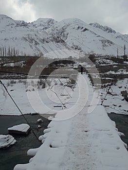 Foot Bridge covered with snow in Gojal Hunza