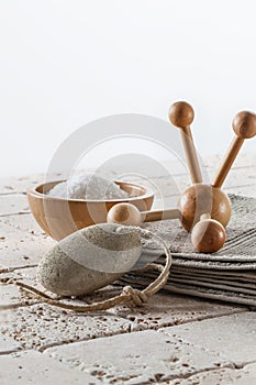 Foot care and soothing bath with pumice, massager and salt