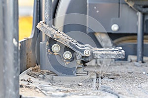 Foot controls and floor of a construction machinery covered in dirt