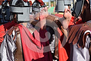 Foot of Jesus Christ`s corpse carried by roman soldiers, street drama, community celebrates Good Friday representing the events th