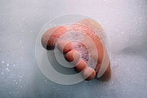 Foot in lather