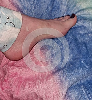 Foot with lotion mermaid blanket toe nails arches