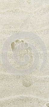 Foot mark in white sand