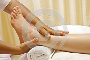 Foot massage, spa foot oil treatment.