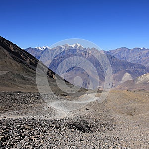 Foot path leading from Thorong La mountain pass towards Muktinath