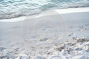 Foot print on sand at beach.Thailand