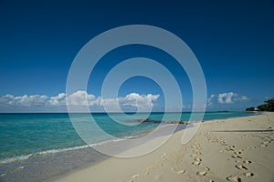 Foot prints in the sand on Bimini beach