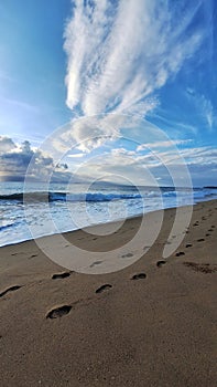 Foot prints on the sand at the Stella Beach in Rincon Puerto Rico