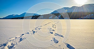 Foot prints in the snow, winter mountain landscape