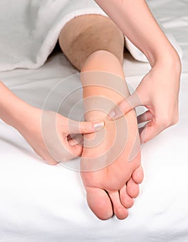 Foot reflexology massage