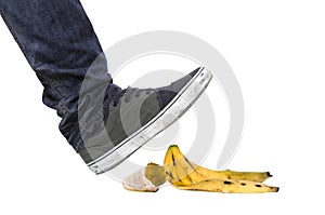 Foot, shoe about to slip on banana peel