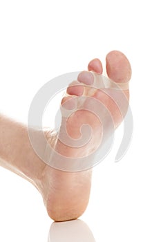 Foot with silicone separator on white background