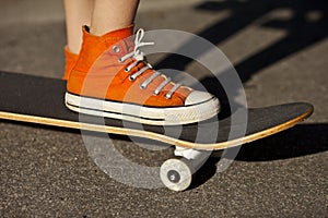 Foot and skateboard photo