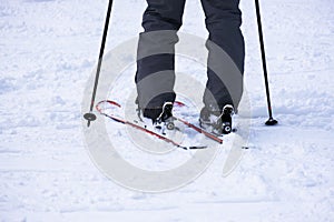 Foot of a skier wearing ski boots