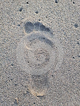 Foot step on beach sand