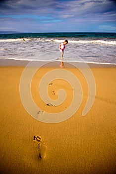 Foot steps in the sand Hawaii