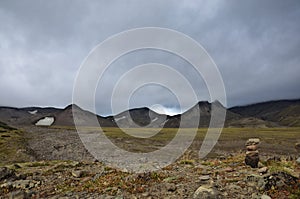 At the foot of the volcano