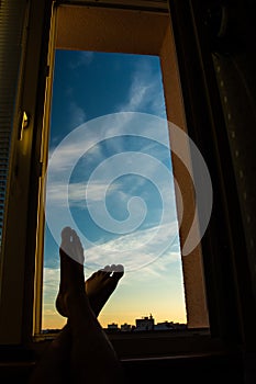 Foot in window