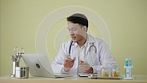 Footage of Caucasian doctor is giving an online consultation to his patients ,concept mental health