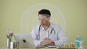 Footage of Caucasian doctor is giving an online consultation to his patients ,concept mental health