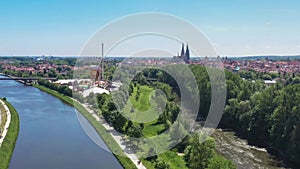 Footage of the city of Regensburg in Bavaria with a view of the Dult folk festival and cathedral, Germany