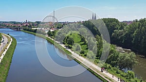 Footage of the city of Regensburg in Bavaria with a view of the Dult folk festival and cathedral, Germany