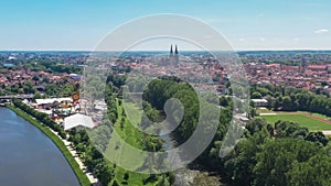 Footage of the city of Regensburg in Bavaria with a view of the Dult folk festival and cathedral, Germany