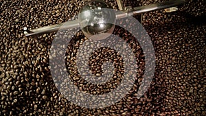 Footage from coffee roaster, fresh roasted coffee beans