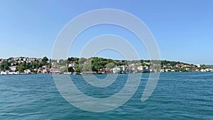 Footage of Istinye area of Istanbul by Bosphorus strait. Beautiful scene. It is a sunny summer day.