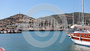 Footage of luxury sail boats and yachts at Bodrum marina.
