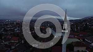 Footage of a mosque and a muezzin calling for the evening prayer with fireworks in the background signalizing the break of fasting