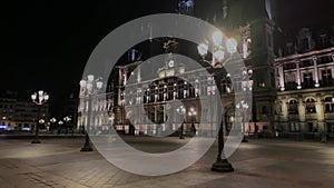 Footage of people walking in front of a historical building housing the city`s administration