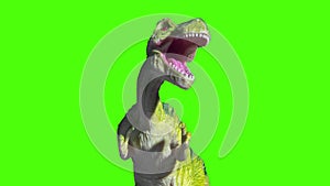 Footage of plastic dinosaur against green screen background