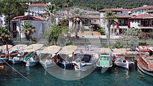 Footage of small, wooden fishing boats, luxury sailboats and yachts in Bodrum