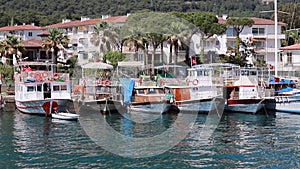 Footage of small, wooden fishing boats, luxury sailboats and yachts in Bodrum