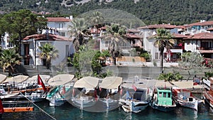 Footage of small, wooden fishing boats, luxury sailboats and yachts in Bodrum