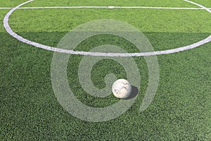 Football on artificial turf. It is for green background in a sta