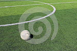 Football on artificial turf. It is for green background in a sta