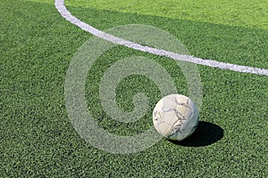 Football on artificial turf. It is for green background in a sta