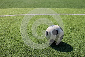 Football on artificial turf. It is for green background in a stadium