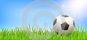 Football background with soccer ball, grass and sky. Vector realistic summer field for poster, banner
